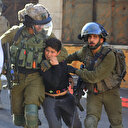 İsrail askerleri 10 yaşındaki Filistinli İsmail'i darp ederek gözaltına aldı