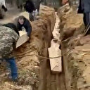 Çernigiv'de hava saldırısında hayatını kaybeden siviller toprağa verildi