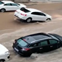 Ankara'da yağmur sele döndü: Rögara takılan otomobil havada asılı kaldı