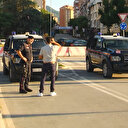 Kosova-Sırbistan gerginliğine neden olan kararın ertelenmesinin ardından Mitroviça'da sessizlik hakim