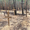 Ukrayna'nın geri aldığı İzyum'da toplu mezar bulundu