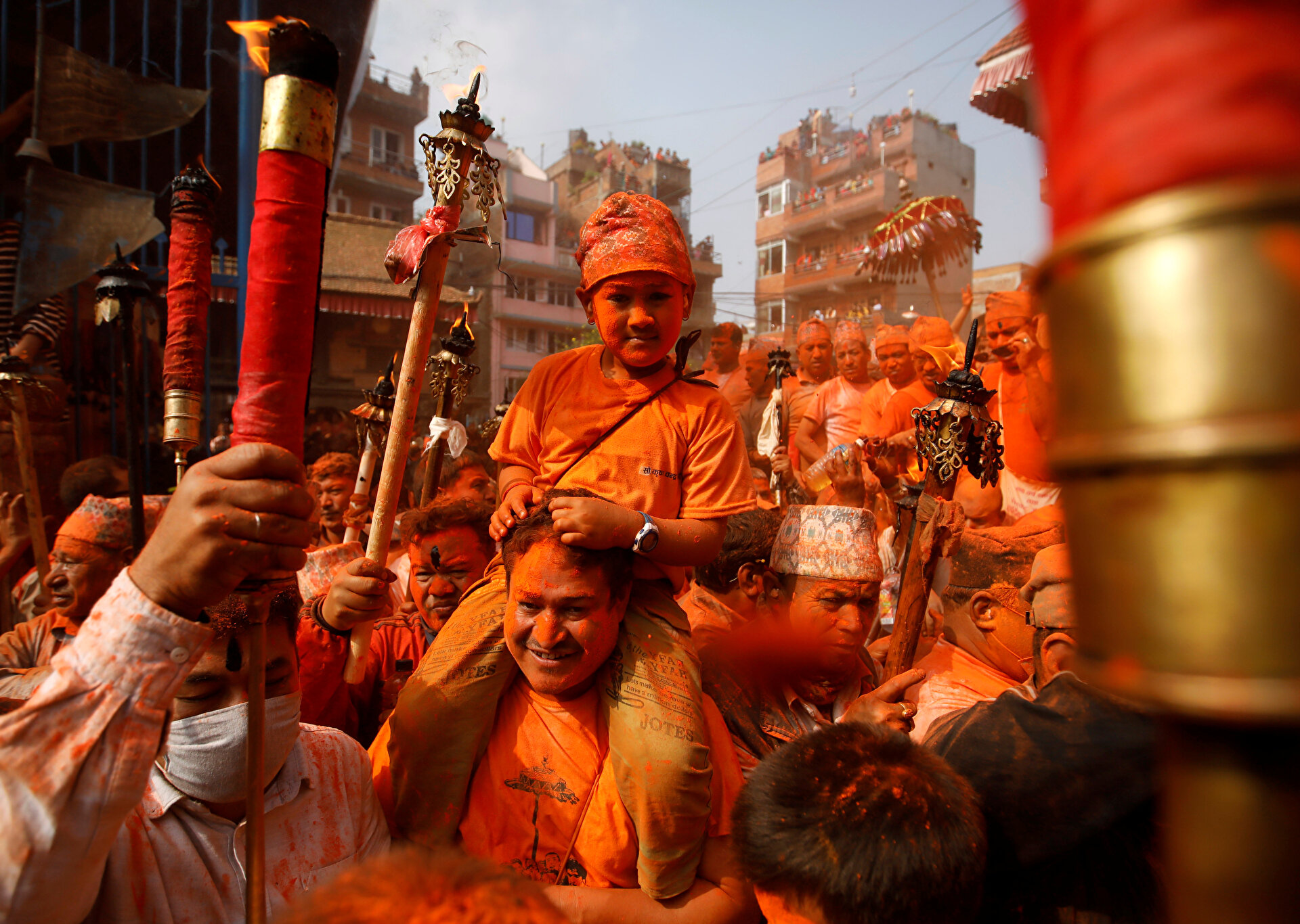 Devotees celebrate 'Sindoor Jatra' vermillion powder festival at Thimi