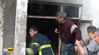 Alevlerin içine daldı