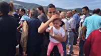 Şehit olan babasını karşıladı