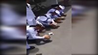 Askeri öğrencilere telefonunu taşla kırma cezası