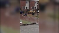 Buz tutan zeminde çöp atmaya çalışan adamın dramı