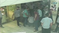 Güvenlik elbisesi ve gaz maskesiyle soygun girişimi