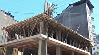 Elektrik direği kaldırılmayınca binanın içinden geçirdi