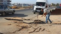 Metan gazı sıkışınca asfalt parçalandı