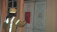 Yangında zarar görmesin diye Türk bayrağını cebine koydu