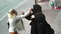Çarşaflı kadınlara çirkin saldırı kamerada