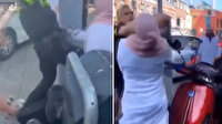 Hollanda polisi Müslüman kadını tekmeleyip yumrukladı!
