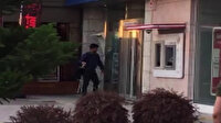 Çekiçle banka soymaya çalışan kişi kamerada