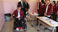 Yürüme engelli öğrenciye akülü araç hediye edildi