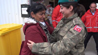 Depremzede kadın, yardım dağıtan Türk subayına sarılıp ağladı