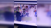 Silahlı soyguncu kasiyere takıldı