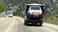 Kamyonet kasasında otomobil taşıdılar