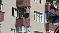 Balkonun kenarına çıkarak dans eden kişi görenleri şaşırttı