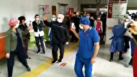 Salgınla mücadele için hastaneye dönüp koronavirüse yakalanmıştı: Emekli doktor 24 gün sonra alkışlarla taburcu oldu