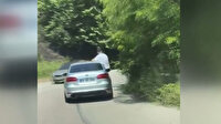 Seyir halindeki otomobilin camından sarkan vatandaş ölüme davetiye çıkarttı
