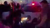 Polis aracını göstericilerin üzerine sürdü