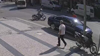 Motosiklet sürücüsü park halindeki otomobil altına böyle girdi