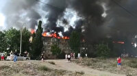 Eşiyle tartışıp binayı ateşe verdi