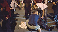 Yarasını bayrağıyla bağladı