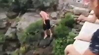 Antalya'da 24 metre yükseklikten suya atlayan genç, yürekleri ağza getirdi