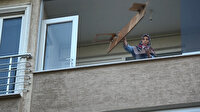 Sinir krizi geçirdi, eşyalarını balkondan sokağa fırlattı