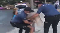 Kadıköy'de maske takmadığı için bir kadını yaka paça gözaltına alan ilgili polis görevinden uzaklaştırıldı
