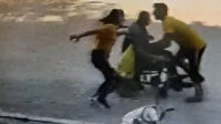 Yokuş aşağı inerken duramayan tekerlekli sandalyedeki adamın kurtarılma anı