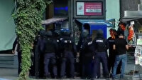 Gürcistan'da silahlı banka soygunu: 30 kişiyi rehin aldılar
