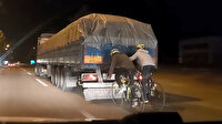 Ölüme meydan okudular: TIR'a tutunan bisikletlilerin tehlikeli yolculuğu kamerada