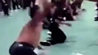 Çinli şirketten ilginç eğitim: Dayanıklılık için çalışılanlara kendilerini tokatlattılar