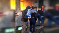 Bağcılar'daki dört katlı binada çıkan yangına şişelerle müdahale ettiler
