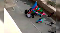 Azerbaycan'da Şuşa'nın Ermenistan işgalinden kurtarılmasını kutlayan genç grup şehit annesinin ayağını öptü