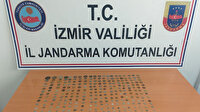 İzmir'de bir otomobilde yapılan aramada 284 tarihi eser ele geçirildi