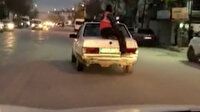Önce otomobili itti, sonra bagajına oturarak yolculuk yaptı