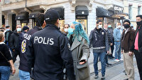 Taksim'de maske takmadığı için ceza yazılmak istenen kadın polise zor anlar yaşattı