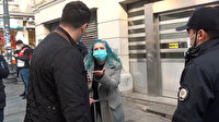 Ceza yazmak isteyen polislerin 'şov yaptığını' iddia eden kadın, vatandaşları da çileden çıkardı