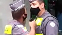 Brezilya'da yemekten geç dönen meslektaşına silah çeken polis kamerada