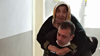 Polisten gönülleri fetheden hareket: Yaşlı kadını beşinci kata kadar sırtında taşıdı