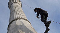 Köy imamı caminin 40 metre yüksekliğindeki minaresini boyayabilmek için dağcılık eğitimi aldı