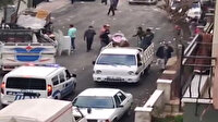Sokak ortasında müzikle beraber oynayan grup polis sirenini duyunca panikle kaçıştı