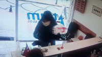 Döviz bürosu sahibi kadın, silahlı soyguncuyu kovaladı