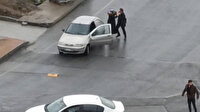Başakşehir'de kadını zorla otomobile bindirmek isteyen kişiye çevredekiler engel oldu