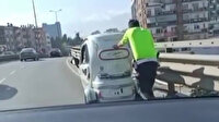 Trafik polisinden gönülleri fetheden davranış: Engelli vatandaşın elektrikli aracını metrelerce itti