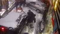 Karda yokuştan kayan aracı el birliğiyle durdurdular