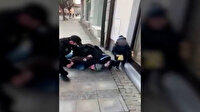 Çekya'da maskesiz bir kişi, hıçkırıklara boğulan küçük çocuğunun önünde yaka paça gözaltına alındı